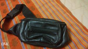 Leather waist bag for traveling.