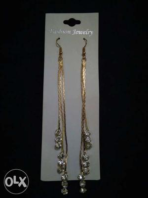 Long tessal earring goes with both traditional