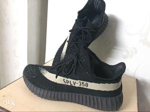 Pair Of Black-and-white Adidas Yeezy Boost Aply-350