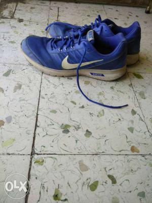 Pair Of Blue-and-gray Nike High Top Basketball Shoes