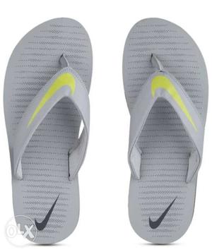 Pair Of Gray-black-yellow Nike Flop Flops
