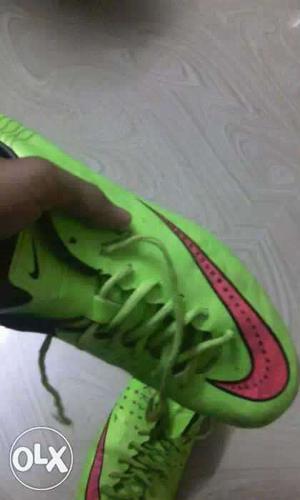 Pair Of Green Nike Cleats