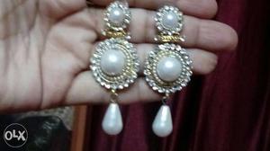 Pair Of Silver And White Pearl Dangling Earrings