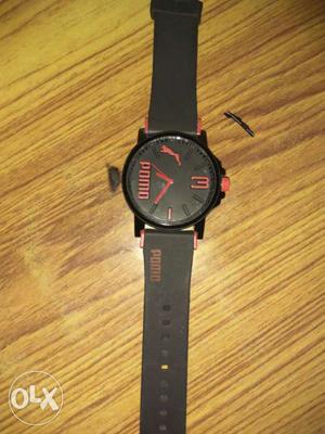Round Black And Red PUMA Watch With Black Leather Strap