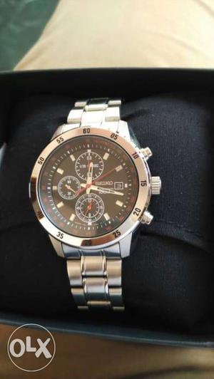 Round Silver Seiko Chronograph Watch With Link Strap