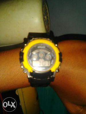 Round Yellow And Black Digital Watch