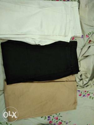 Rs 799 each black and peach trousers And white jeans