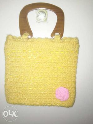 This is a woolen hand made purse