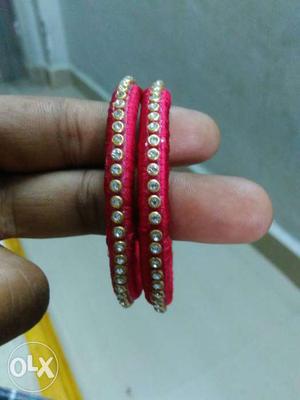 Two Diamond Embellished Pink Jhumkas Bracelets