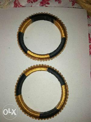 Two Yellow-and-black Diamond Bracelets