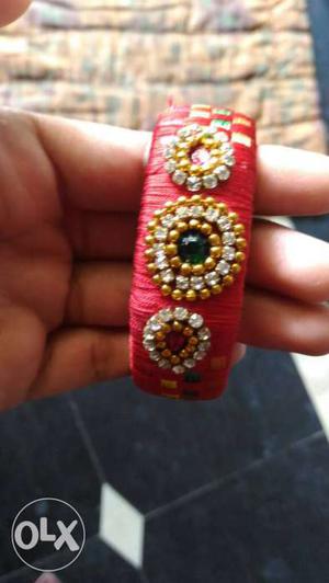 Woven Red, Yellow, And Pink Bracelet