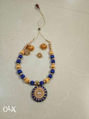 Yellow And Blue Beaded Necklace With Round Pendant And Pair