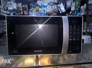 Black And Silver Samsung Microwave Oven