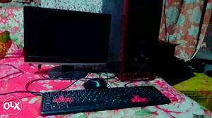 Black Flat Screen Monitor, Keyboard And Mouse