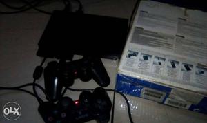 Black Sony PS2 Game Console with full kit