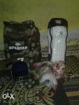 Brown Spartan Camouflage Backpack And White SS Knee Pads