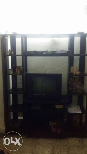 CRT Television And Black Wooden TV Stand