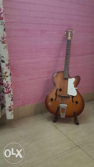 Givson Guitar with guitar stand. Great condition!