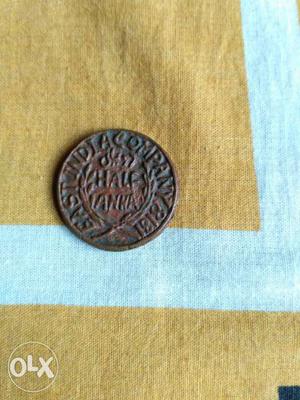 Half anna coin of early British India. copper