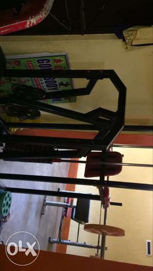 Leg press + bar gym equipment at mint condition