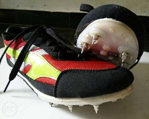 Pair Of Black-and-red Soccer Cleats