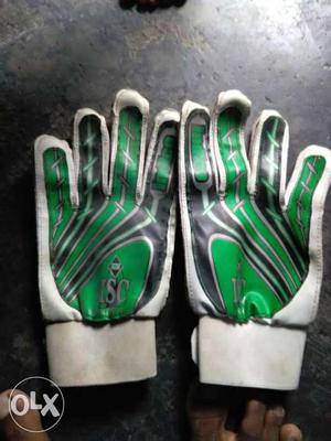 Pair Of White And Green Gloves