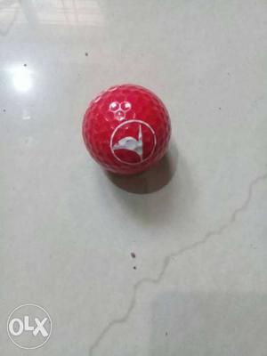 Red And White Golf Ball