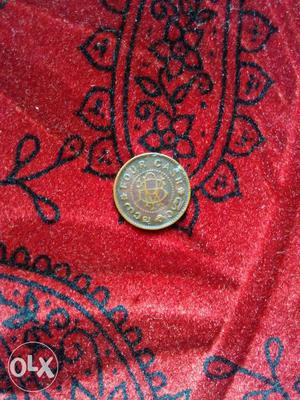 Round Bronze Four Cash Coin. Over 100 Years Old.