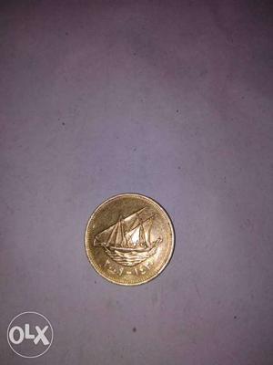 Round Gold Boat Embossed Coin