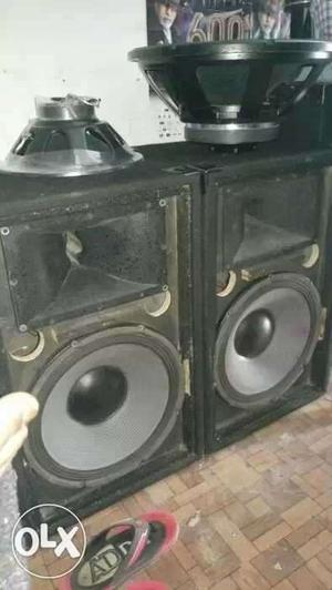 Two Black Speaker Cabinets