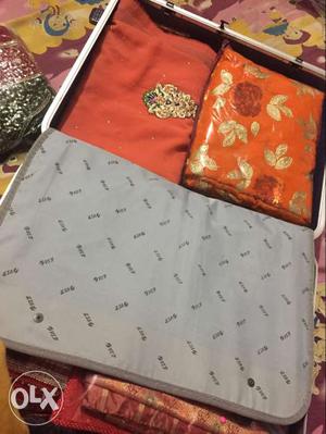 Two Orange Printed Textiles