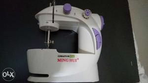 White And Purple Sewing Machine