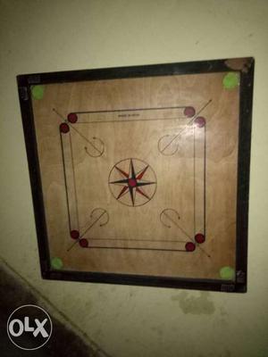 Brown And Black Carrom Board