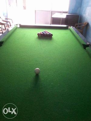 Green And Brown Pool Table