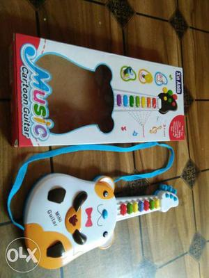 Mini guitar for children under 3 year its in a