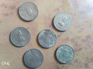 Six 20 Paise Coins