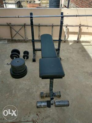 Unused Multi exercise bench press + 50 Kg weights