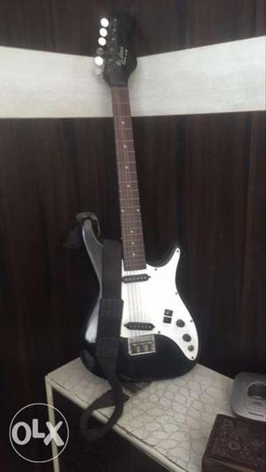 White And Black Squire Stratocaster Electric Guitar