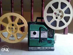 16mm reel projector working condition. antique &