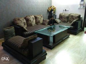 5 seater sofa 1 divider and 1 center table.