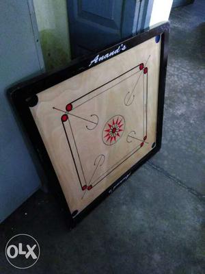 A excellent condition carrom board with fiber