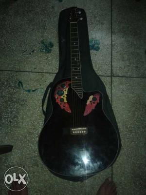 Black And Brown Wooden Guitar With Case