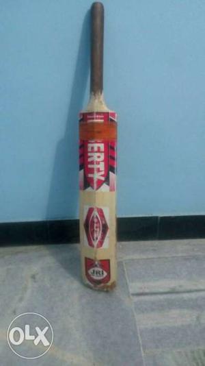 Brown And Red Wooden Cricket Bat