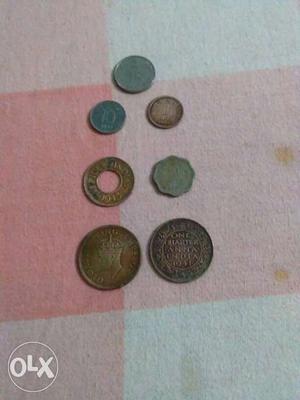 Brown, Gray, And Silver Coinage