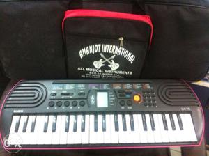 Casio sa 78 with adaptor and cover