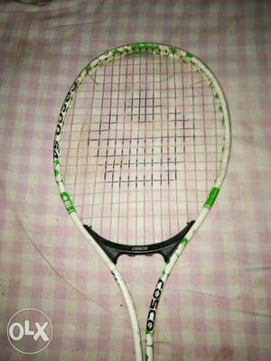 Green And White Tennis Racket