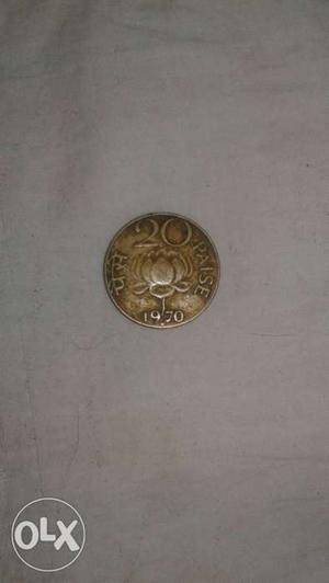 Its a 20 paisa coin of  indian ruppes