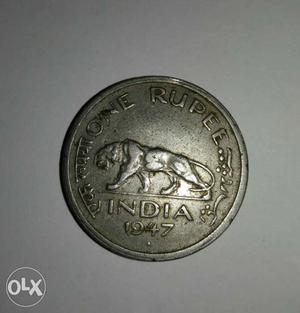 One rupee coin ()