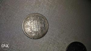 This coin is 73 years old. It is clear.