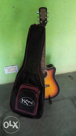Brown Acoustic Guitar With Case